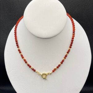 Faceted Red Bead Necklace with Gold Accents